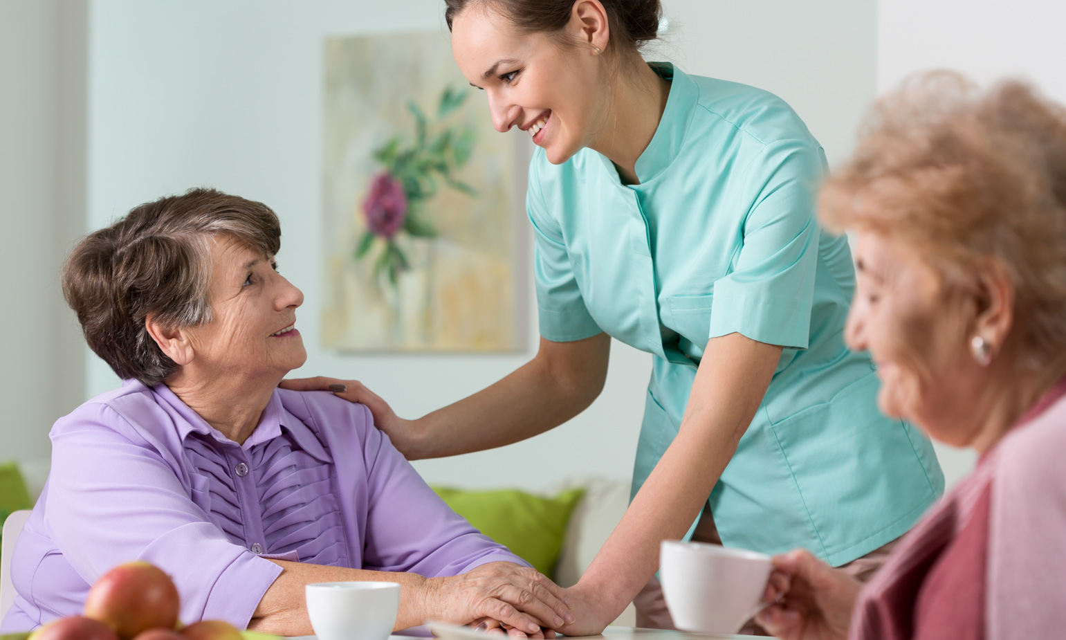 nurse-attending-to-older-ladies
